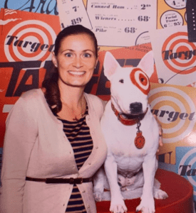 Jennie next to Bullseye, Target's mascot dog